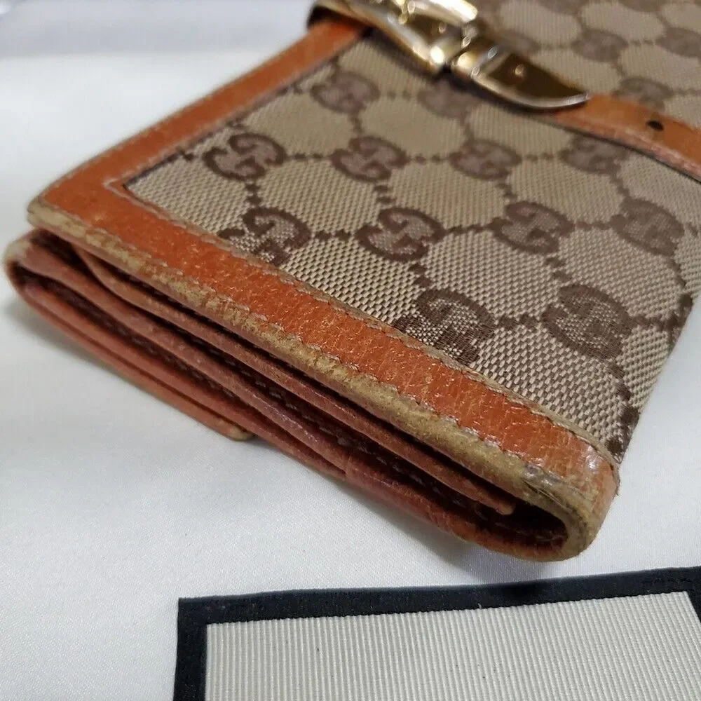 Gucci GG Logo Continental Canvas Tan Bifold Wallet with Leather Trim. 1462012778